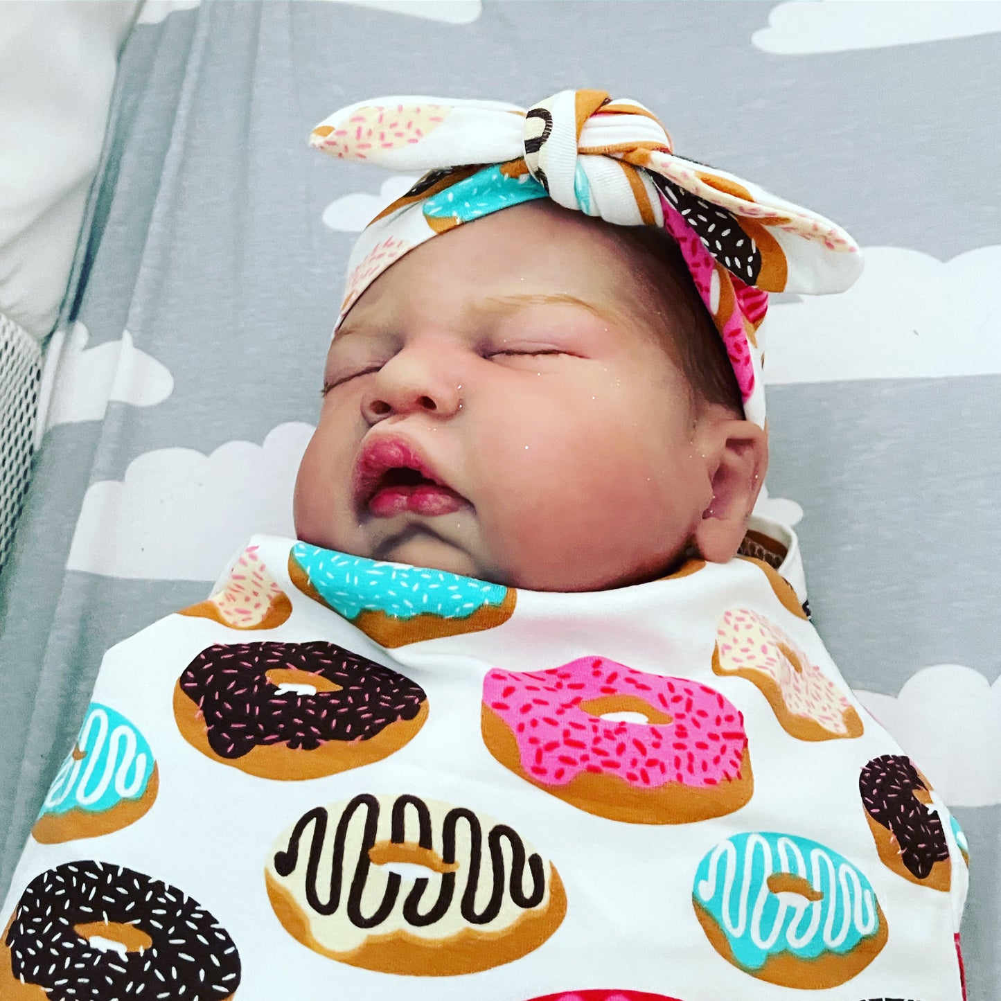 Baby swaddle pouch with headband