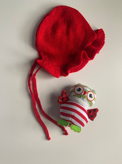 Red knitted baby hat