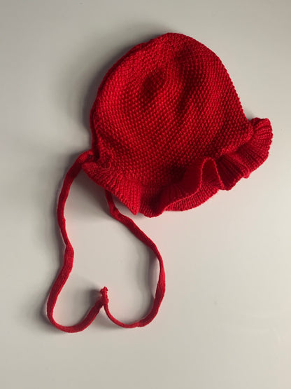 Red knitted baby hat